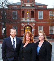 family law attorney team picture in front of the courthouse in Annapolis MD