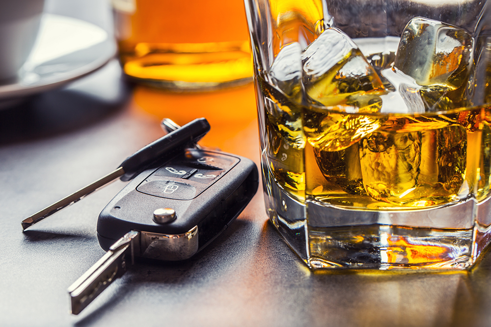 Maryland DUI and DWI Defense LawyerCar keys and glass of alcohol on table
