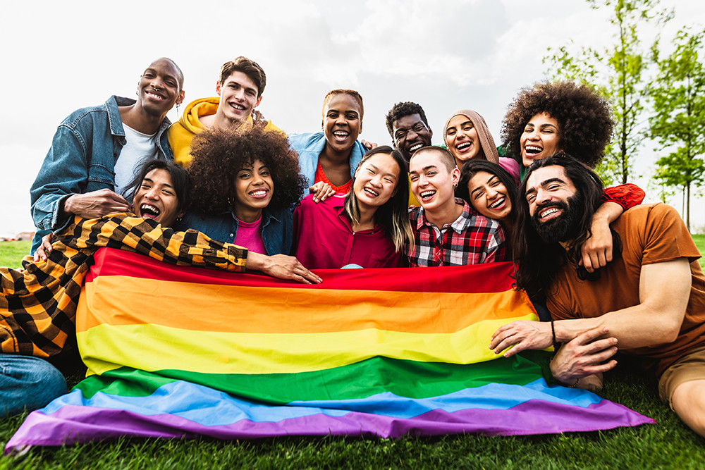 Same Sex Family Law - Happy diverse young friends celebrating LGBTQ pride